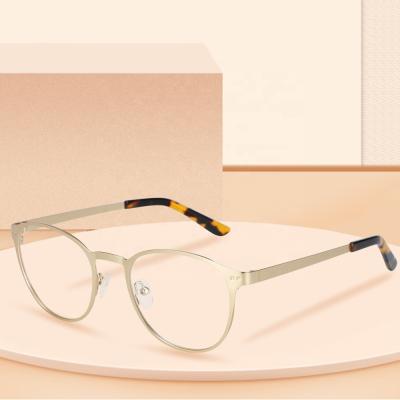 China Gold Glasses Frames Retro Optical Glass Frames Gold Stainless Steel Women Optical Custom Logo Light Vintage for sale