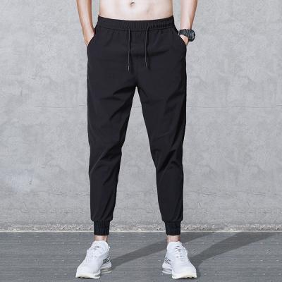 China Anti-wrinkle new sweatpants men's streetwear pants fashions pencil canvas pants mens casual pants for sale