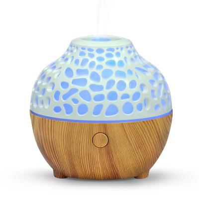 China Best Feeling Comfortable Selling 60ml Mini Wood Fiber Oil Diffuser Home Diffuser Ultrasonic Light Luxury USB Aromatherapy Diffuser for sale