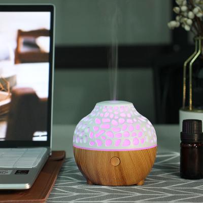 China Feel Comfortable Colorful Fragrance LED Lights Mini Ultrasonic Air Diffuser Humidifier Diffuser DC 5V Humidifier Aroma Diffuser for sale