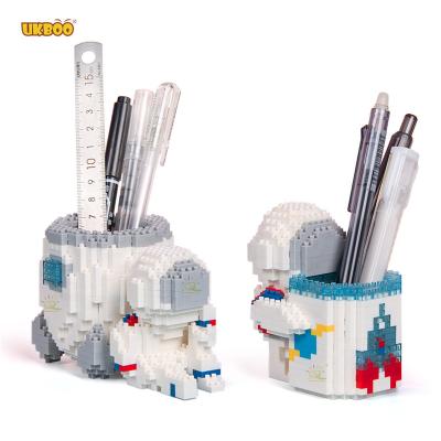 China Building Toy Free Shipping UKBOO Astronaut Figures Toys Pencil Stand Microphone Assemble Building Blocks For Kids Birthday Gift for sale