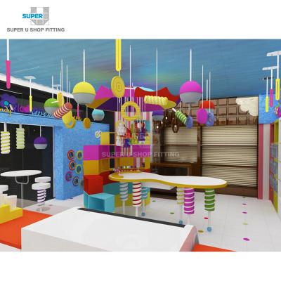 China Custom cute cute candy display for store colorful candy shop interior design candy store furniture decorations for sale