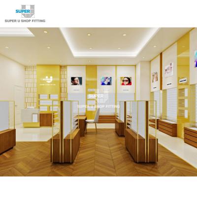 China Powder Coated Steel Luxury Commercial Custom Optical Shop Showcase Glass Shop Showcase Sunglass Decoration Gold Interior Design for sale