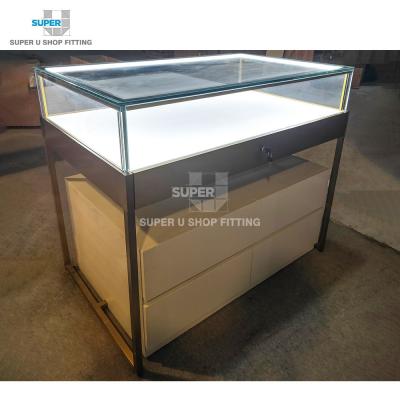 China Neat Gold Metal Frame Floor Stand Showcase Wholesale Luxury Custom Glass Display Jewelry Showcase For Mall for sale