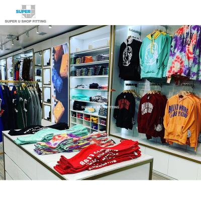 China Wholesale Fashion Men Clothes Shop Interior Design Customized Gold Store Fixtures Clothing Display Rack For Clothing Store for sale