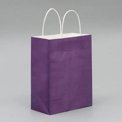 China Bio ribbon handle gift paper bags with handle logo bulk paper blue paper bags with handles for sale