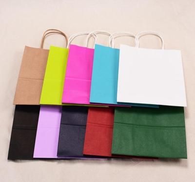 China Custom Printed Organic Luxury Gift Paper Carrier Bag With Tied Cotton Rope Handles Design Black Luxury Gift Paper Bags With Handles for sale