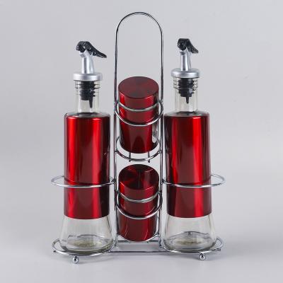 China Viable Kitchen Glass Salt Pepper Jars Spice Storage Outsourcing Iron Sheet Seasoning Jar Glass Oil Bottle With Iron Rack Set Red for sale