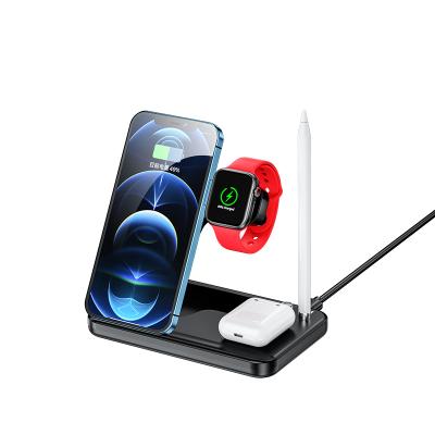 China UniversalÂ   new arrival 2021 15W fast 4 in 1 wireless phone charging station for mobile phone watch earphone for sale