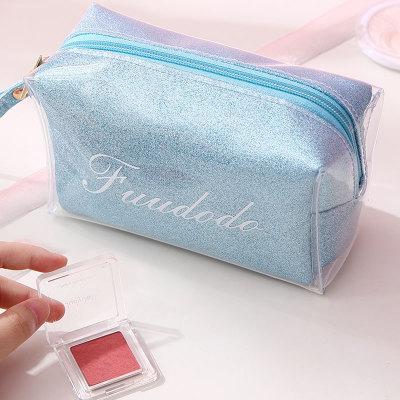 China 2020 Jelly TPU Glitter Cosmetic Bag Holographic Cosmetic Bag Comfortable Custom Travel Makeup Bag For Ladies for sale