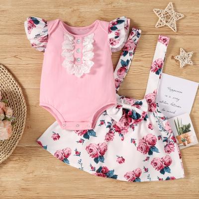 China Wholesale Breathable Baby Clothes Ruffle Baby Rompers With Floral Bow Skirt Suspender Baby Two Piece Sets for sale