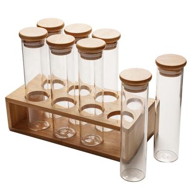 China Bamboo Glass Set Of 8 Pcs Sustainable Food Kitchen Jars Bottle Storage Spice Jars for sale