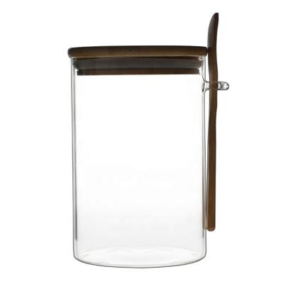 China Clear Glass Cover Kitchen Food Storage Jar Storage Jar With A Spoon Spice Jars for sale