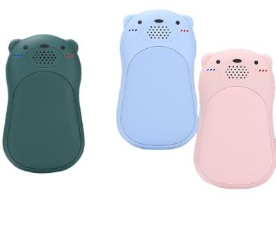 China 2022 new hotel desgion mini portable reusable foot and hand warmer usb power bank rechargeable hand warmer with music play for sale