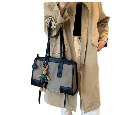 China Lady 2020 Winter Solid Tote Shoulder Bag Ins. Bear Warm Pendant Office Tote Bag for sale