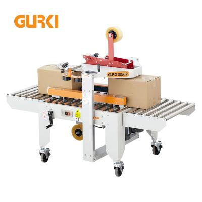 China Automatic CLOTHING Carton Flaps Folding Sealer Case Closing Packing Machine for sale