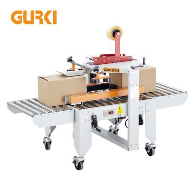 China Small CLOTHING Box Taping Carton Folding Machine Box Sealing Sealer for sale