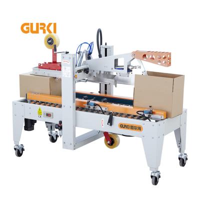 China Fully Automatic CLOTHING Small Carton Sealer For Small Boxes for sale