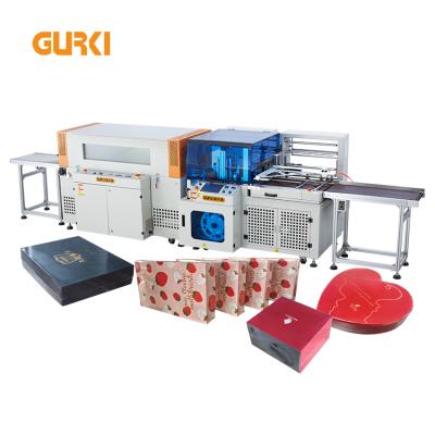 China Food Heat Shrink Wrap Sealing Machine Pof Pvc Pe Film Carton Box Cling Thermo Shrink Wrapping Package Machine for sale