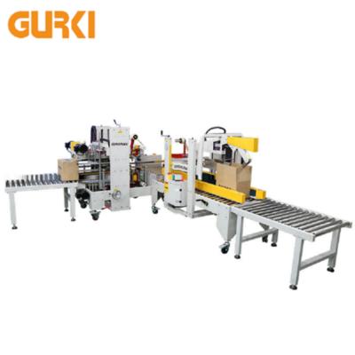 China CLOTHING GURKI Packing Line Automatic Unpacking Machine And Carton Box Sealing Machine for sale