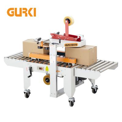 China Automatic CLOTHING Milk Carton Packing Carton Sealer Sealing Machine for sale