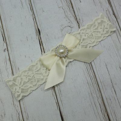 China Polyester lace cheap ivory simple bow garters, good elastic bridal lace leg wedding garters for sale