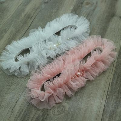 China /Polyester Pink White Pearl Embellished Bridal Wedding Garter Garter For Leg Decoration for sale