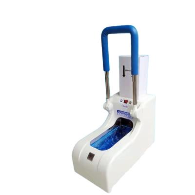 China Hot Sale Stored Automatic Nonwoven Shoes Cover Dispenser Machine For Disposable Plastic Shoe Cover for sale