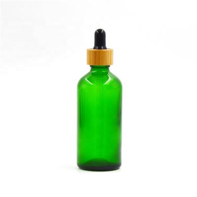 China Custom logo skin care 5ml 10ml 15ml cosmetic essential oil empty glass bottle with bamboo dropper bottle for sale