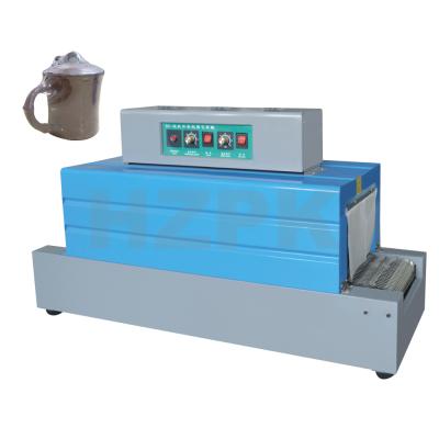 China Semi-automatic food ex-factory price BS-260 shrink packaging machine/far infrared heat shrink wrap machine for sale