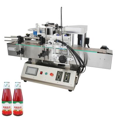 China New Type Benchtop Food Labeling Machine is widely used for round body bottle (bottle rack) for sale