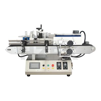 China New Type Benchtop Food Labeling Machine is widely used for round body bottle (straight) for sale