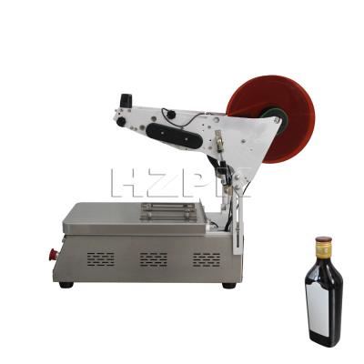 China HZPK Food Desktop Small Manual Labeling Machine For Water Bottles Flat Sticker Packing for sale