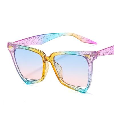 China Luxury Rainbow Cat Eye Sunglasses Leopard Rivet Sun Glasses Women Fashion Sun Glasses for sale