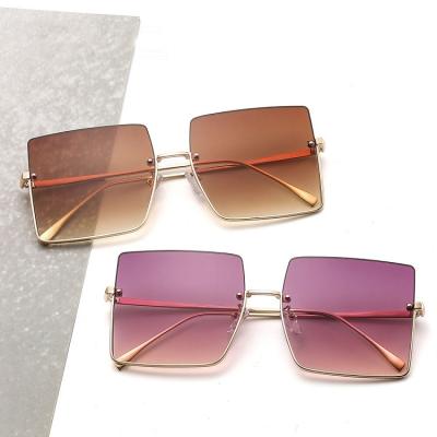 China Fashion Sunglasses 36020 Metal Fashion Rimles Sunglasses Women Luxury Square Sunglasses for sale