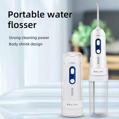 China Household Portable Handheld Tooth Punch Oral Irrigator Water Flosser In Battery Power Source With USB Direct Charging for sale