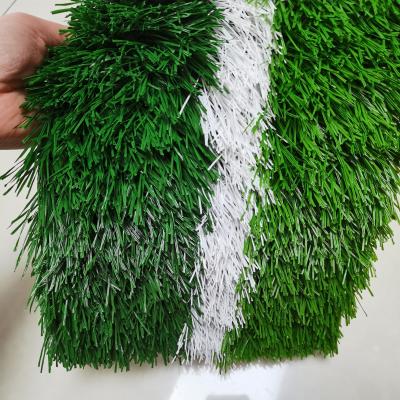 中国 Football Artificial Grass 12000 dtex 20mm Synthetic Grass Football playground Artificial Grass Football boots 販売のため