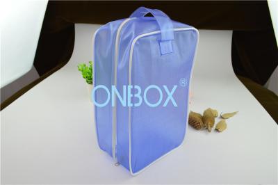 China Tragende blaue Farbe-PVC-Geschenk-Tasche PVC-Handtasche mit Reißverschluss-Schließung/Griff zu verkaufen