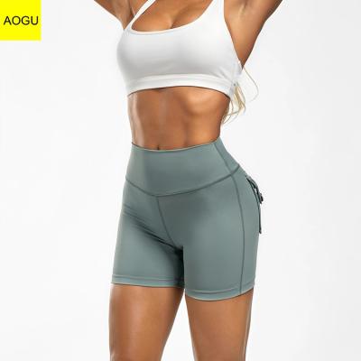 China QUICK DRY Custom High Wasted Simple Workout Biker Fitness Women Yoga Shorts With Pockets for sale