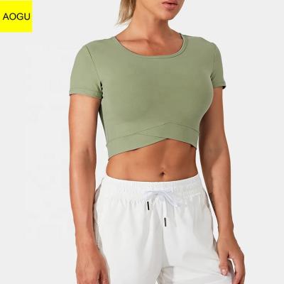 China AOGU Compressed Sports Crossover Hem Cropped Top Women Fitted Short Sleeve T-Shirt for sale