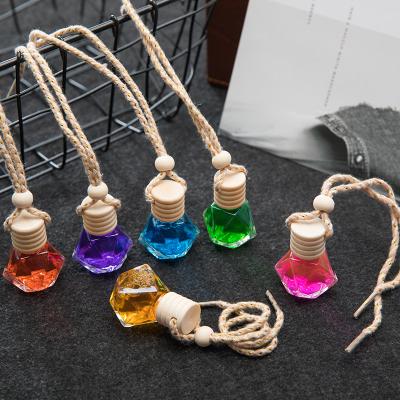 China Car Perfume Glass Bottle Air Freshener Diffuser Hanging Car Empty Glass Refillable Perfume Bottle For Auto Pendant Smell Essential Oi for sale