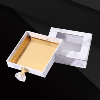 China Recycled Materials Good Quality OEM Service Custom Ribbon Stamping Paper Boxes Eyelash Packaging Gift Boxes for sale