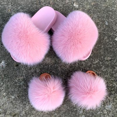 China 2021 Fashion Trend Colorful Rainbow Mommy And Me Real Shoe Sets Summer Fox Raccoon Fur Fluffy Slides For Kids And Women for sale