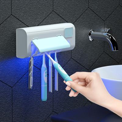 China Sustainable Toothbrush Holder Disinfection Bathroom Wall Mount Toothbrsuh Dispenser for sale