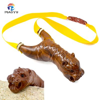 China Beautifully New Piaoyu Leopard Head Wooden Shooting Slingshot Others Hunting Slingshots With Leather Band for sale