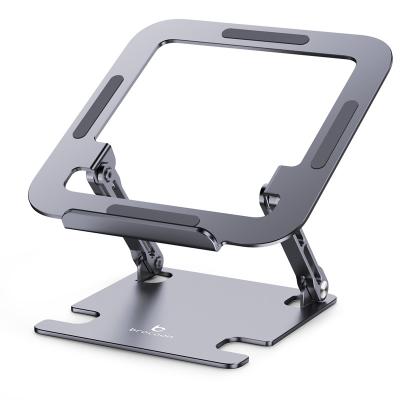 China (Size) Adjustable Low MOQ Hollow Out Foldable Aluminum Notebook Stand Laptop Stand Holder for sale