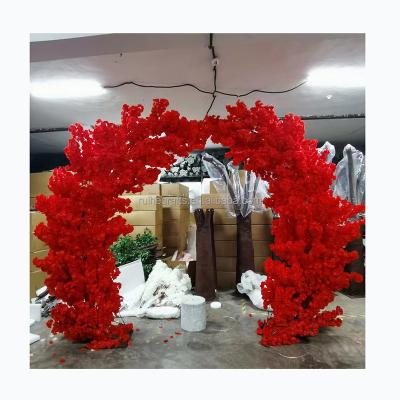 China Wedding table decoration Ruihe wholesales red cherry blossom tree cherry arch wedding stage backdrop decoration for sale