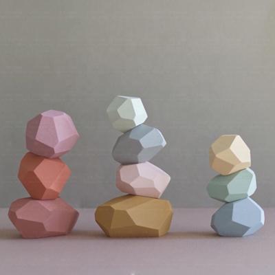 China Eco-friendly fashion creative Nordic wind colored stone ornaments educational toys wooden toys balancing stones for sale