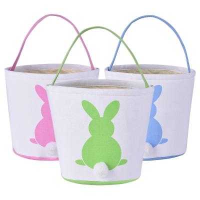 China Festival Decoration/Daily Wholesale Fluffy Easter Egg Basket Canvas Easter Bunny Baskets Cute Decorative Tail Bucket Bag for sale