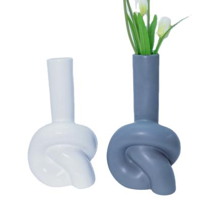 China 2022 minimalist new design vertical touch three-dimensional bottle mouth height suitable for creative ceramic round tube vase for sale